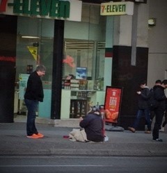 sitting on Robson Street